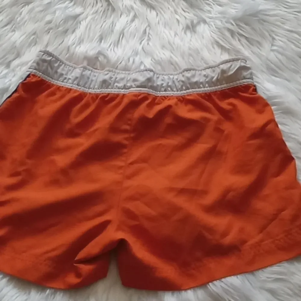 Nike sport orange  woman's short size M(8-10)